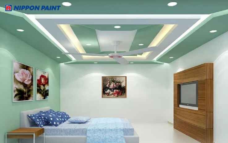 Phòng ngủ có tường màu xanh pastel dịu mát và dễ chịu