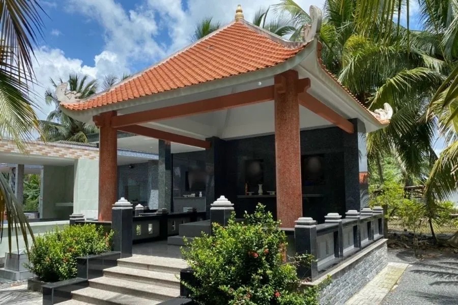Mẫu nhà mồ xây gạch ốp đá